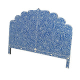 An ornate, blue and white patterned headboard with a scalloped top edge and intricate vine and leaf designs. The symmetrical design and classic elegance make this Handmade Bone Inlay Bed & Headboard Furniture by Matrix Global Market a timeless choice for any bedroom decor.