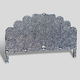 Matrix Global Market's Handmade Bone Inlay Bed & Headboard Furniture features a decorative headboard with an arched top and intricate floral patterns. The design showcases white floral and leaf motifs against a dark blue background, creating a detailed and ornate appearance. This piece of bed furniture also includes a plain grey background for added elegance.